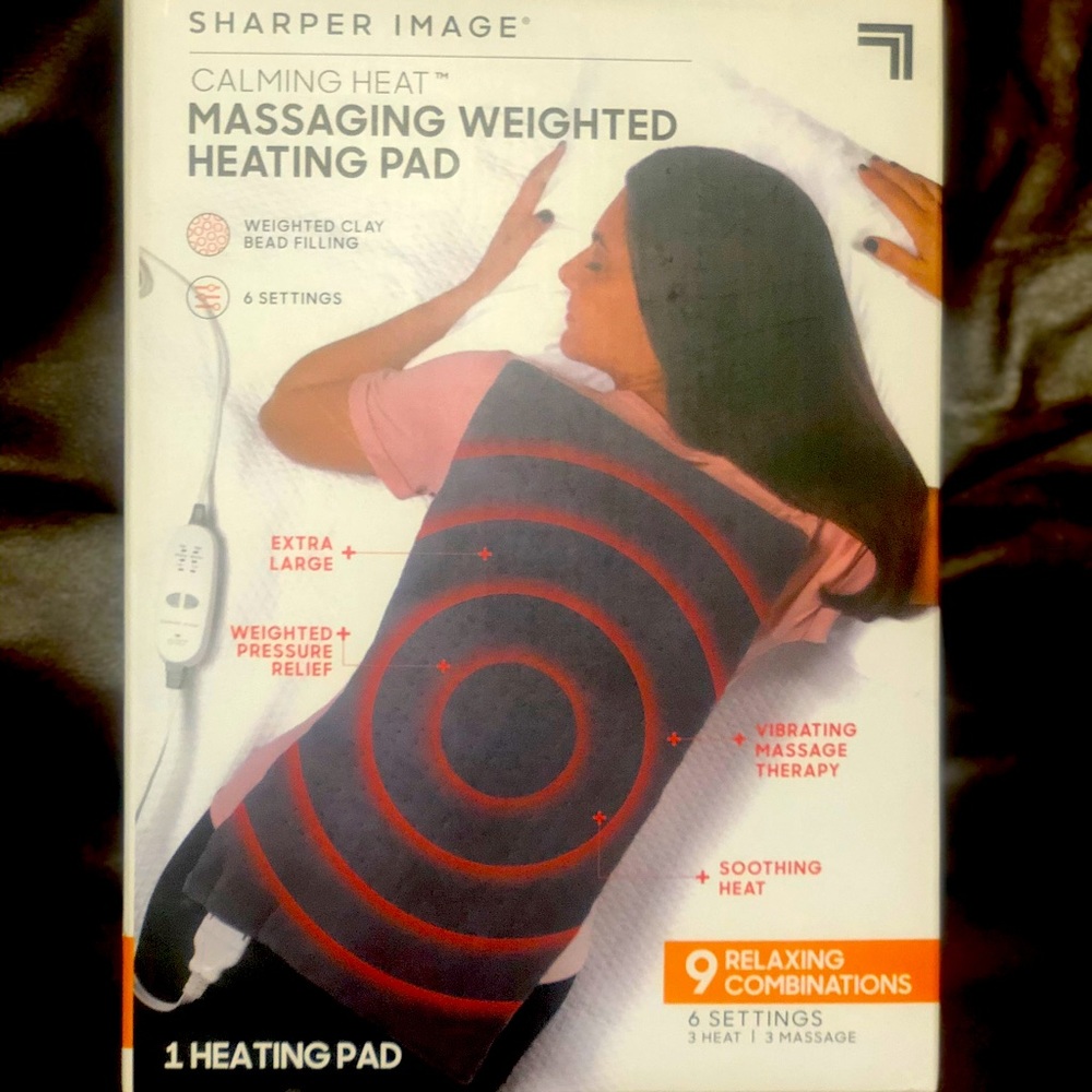 Sharper image massaging weighted heating pad